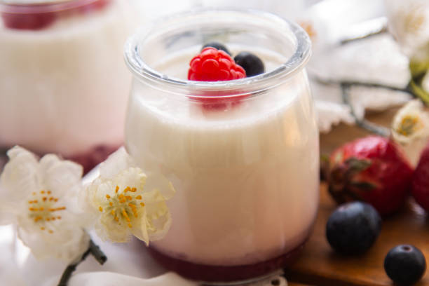 istock yogurt with wild berries on wooden background 1359961780