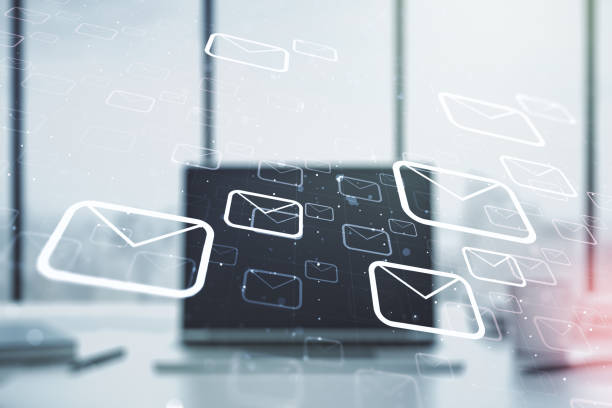 istock Creative concept of postal envelopes illustration on modern laptop background. Email and communications concept. Multiexposure 1359965396