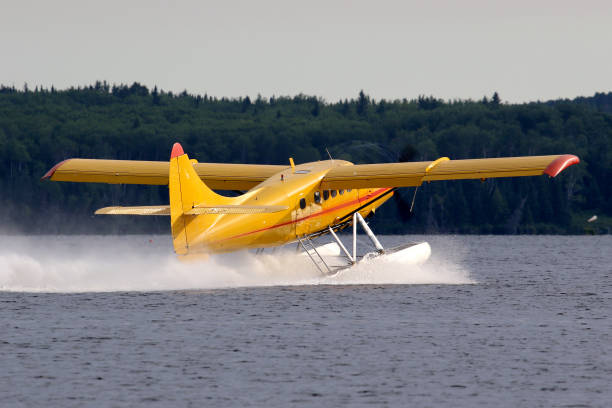 A rotary engine bush plane departs for the wilderness.