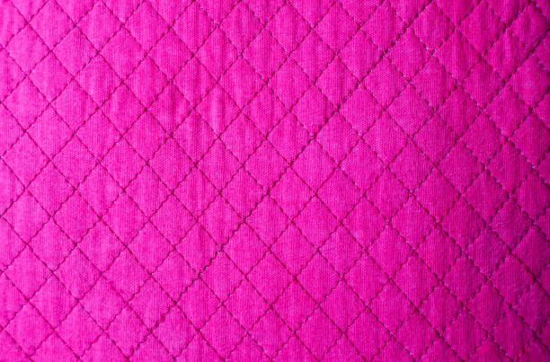 istock fuchsia texture with diamond pattern. background for fashion themed graphic resources. 1359972283
