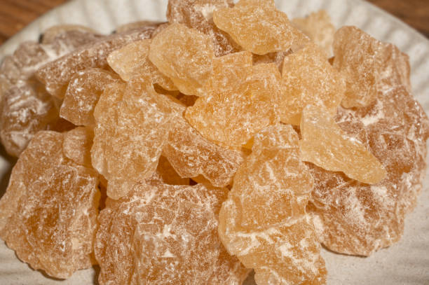 istock Rock sugar in the container on the wood grain table 1359975158