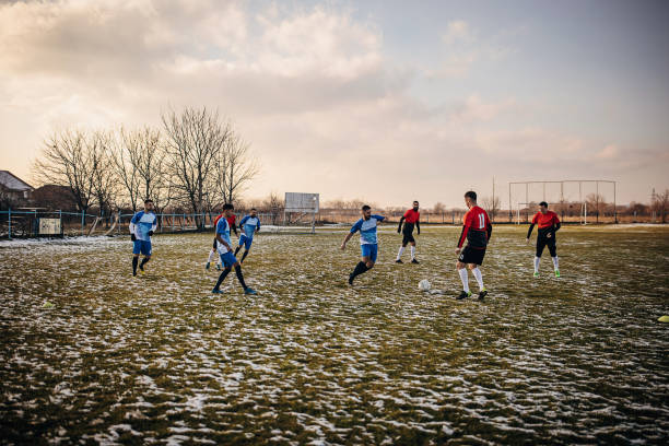 istock Soccer match on winter day 1359976082