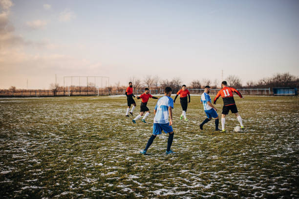 istock Soccer match on winter day 1359976227
