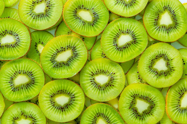 istock Kiwi Macro,Fresh Kiwi fruit sliced use for background 1359976337
