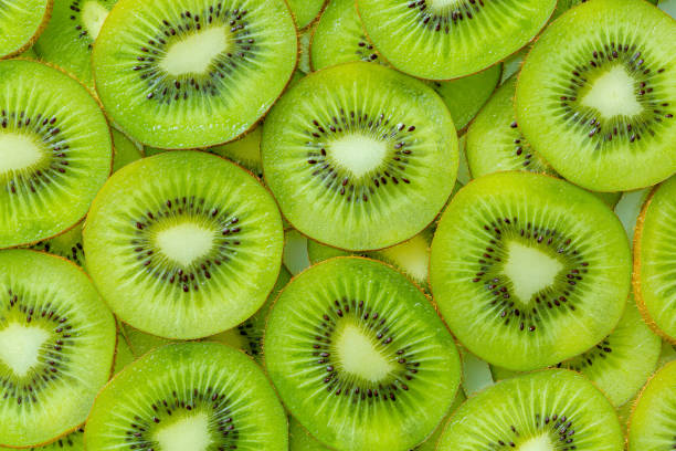 istock Kiwi Macro,Fresh Kiwi fruit sliced use for background 1359976345