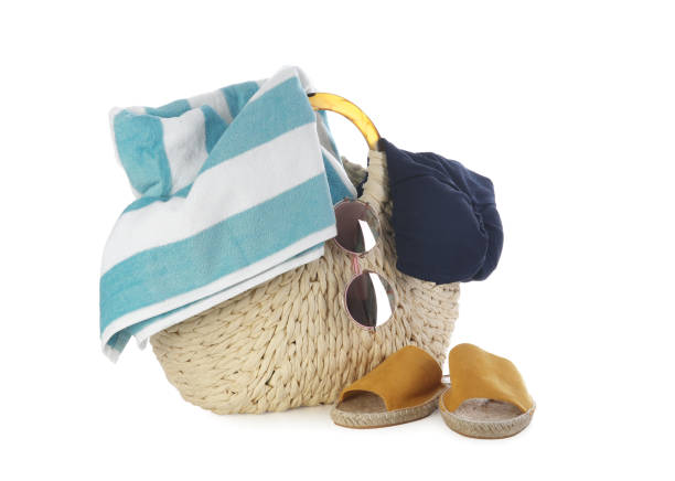 istock Bag with beach accessories on white background 1359979551