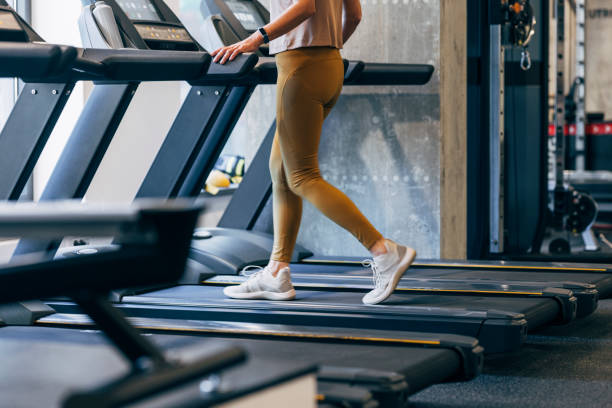 istock An Unrecognizable Female Walking On A Treadmill In The Gym 1359980305
