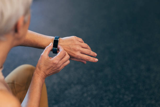 istock An Unrecognizable Senior Woman Setting Her Wristwatch 1359980834