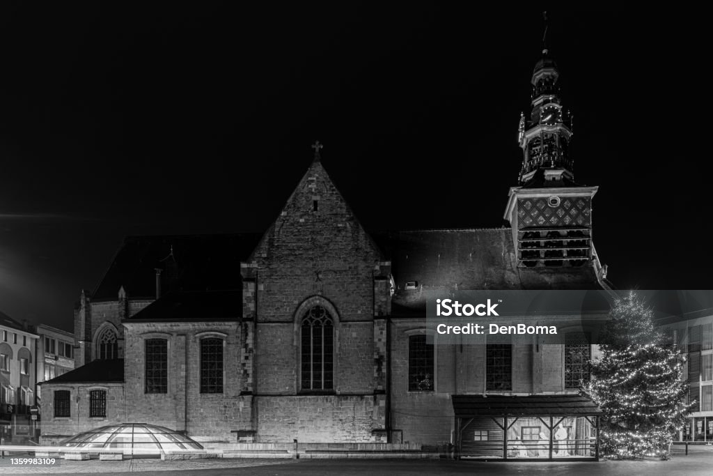 The Church Zottegem This Church of Zottegem is located in East Flanders in Belgium, during the Christmas period with a Christmas tree Architecture Stock Photo