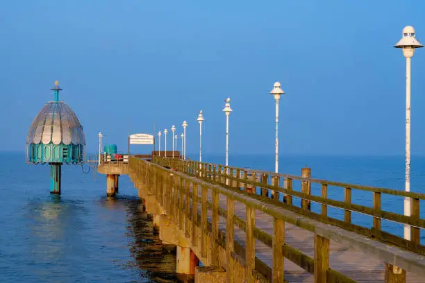 View of the pier in Zinnowitz / Germany and the diving bell on Usedom