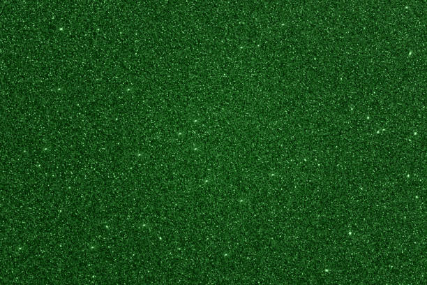 istock Glitter green Christmas holiday background texture 1359989518