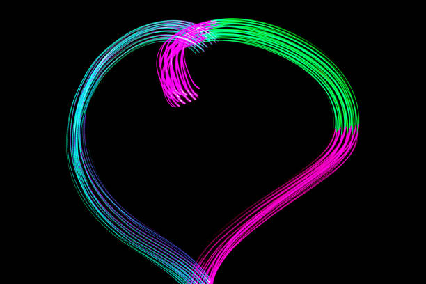 istock Light Neon Trails Colorful Wave Isolated on black background. 1359990935
