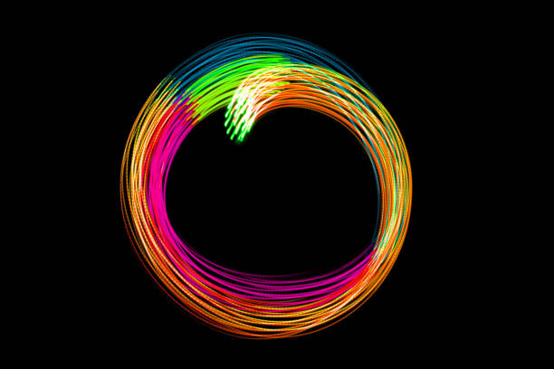 istock Light Neon Trails Colorful Wave Isolated on black background. 1359990940