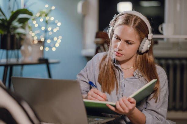 istock Working late at home on laptop 1359991068