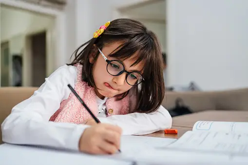 Doing homework child for writing
