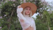 Fashion Blonde Woman In Romantic Spring Outfit In The Park Female Womanly Beauty Portrait Fashion Blonde Woman In Romantic Spring Outfit In The Park Female Womanly Beauty Portrait