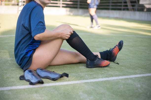 istock Close-up of young woman getting dressed for training 1359995125