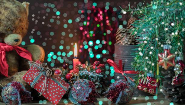 istock Teddy bear, fir branches and christmas decorations 1359996655