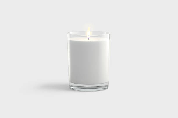 istock Blank white pillar candle in glass jar mockup, gray background 1359999880