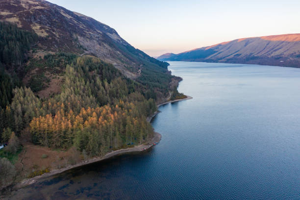 istock Scottish Loch and Mountain Landscape at Sunset 1360001343