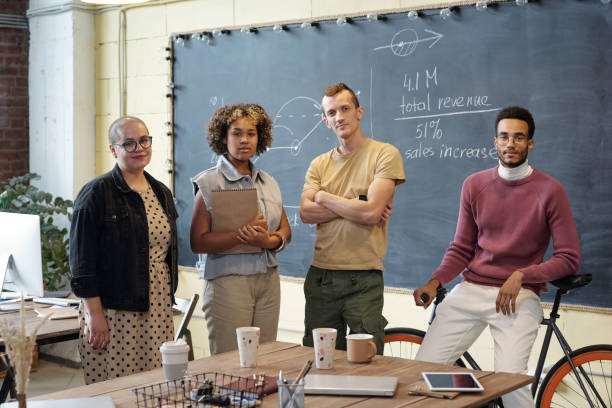 istock Row of young successful white collar workers 1360001373
