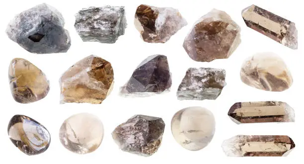 set of various smoky quartz crystals cutout on white background