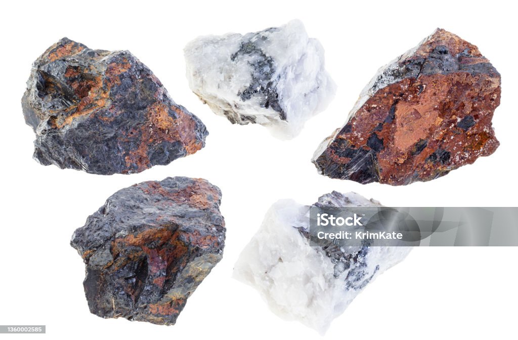 set of various wolframite stones cutout on white set of various wolframite stones cutout on white background Tungsten - Metal Stock Photo