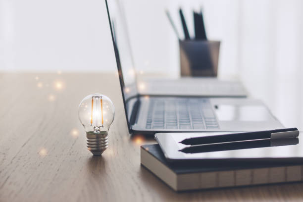 istock Bright light with book. Business success idea and studying concept 1360005032