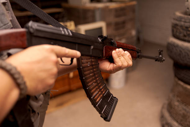 istock Soldier with rifle 1360006296