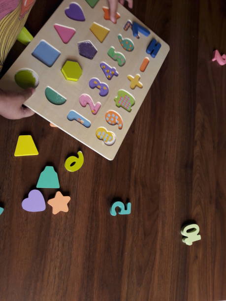 istock Children's toy alphabet board on the table 1360008600