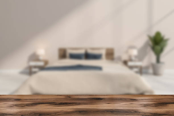 istock Table for product display with blur beige bedroom on background 1360008663