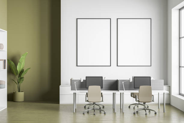 istock Two canvases on wall in white and olive office 1360010839