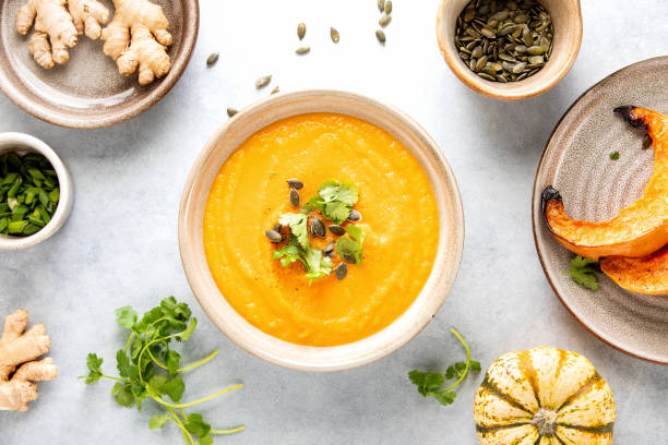 istock Ginger and pumpkin vegetarian soup 1360011880