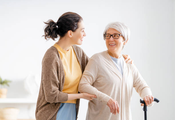 istock Happy patient and caregiver 1360012490