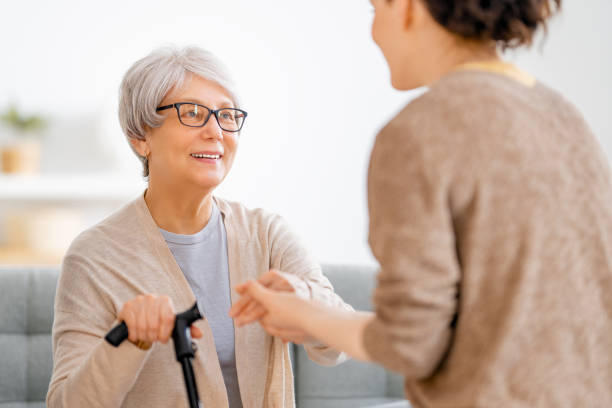 istock Happy patient and caregiver 1360012500
