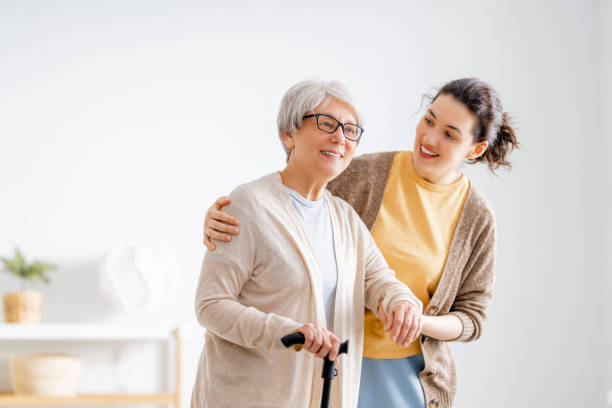 istock Happy patient and caregiver 1360012716