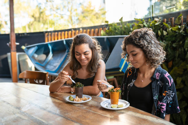 istock Women enjoying shrimp and bean broth 1360013713
