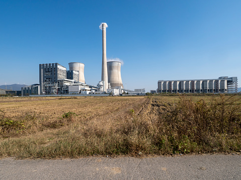 Thermal power plant standing on the field