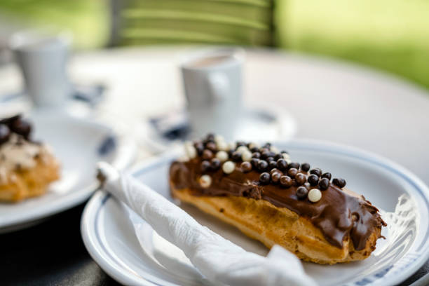 Tasty eclair pastry filled and covered  with chocolate