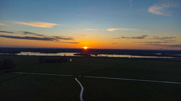 istock Sunset over the IJsseldelta drone view 1360016882