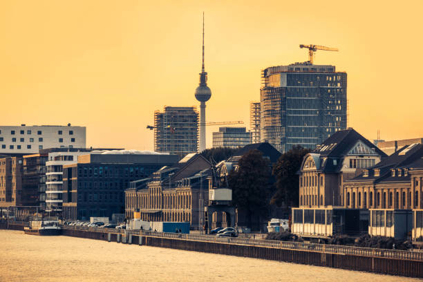 istock promenade at spree river and TV Tower in Berlin, Germany 1360018421