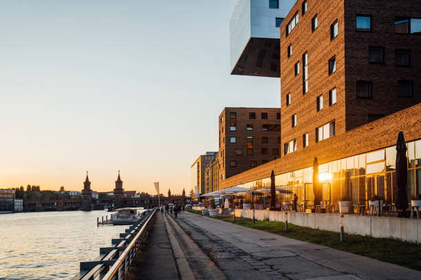 istock promenade with restaurants at spree river in Berlin, Germany 1360018473
