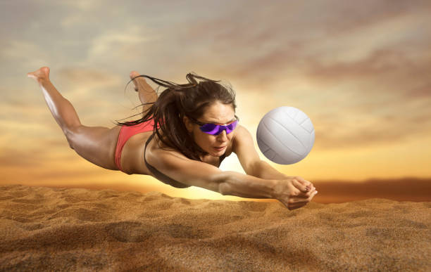 istock Female volleyball beach  player 1360019008