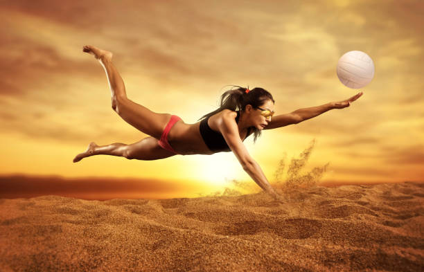 istock Female volleyball player in action 1360019012