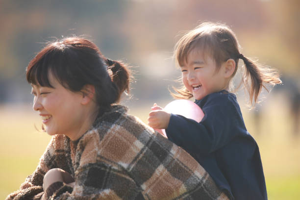 istock Smiley parent and child 1360023880