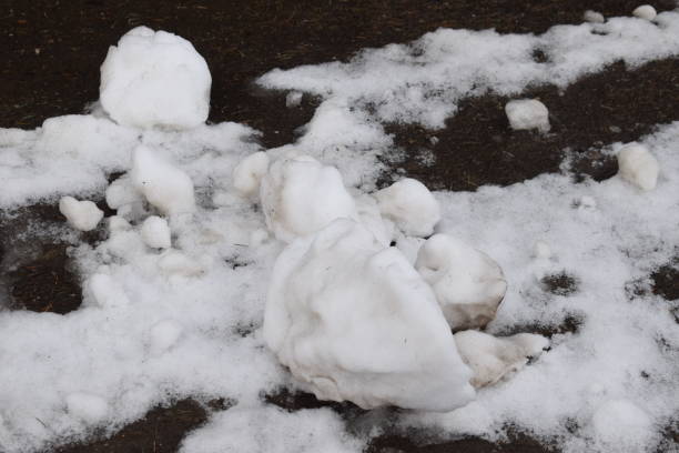 istock frozen snow rocks on the road 1360024060