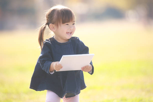 istock Girl with a book 1360024952