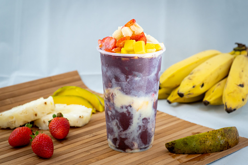 Açaí with icecream banana strawberry fruits