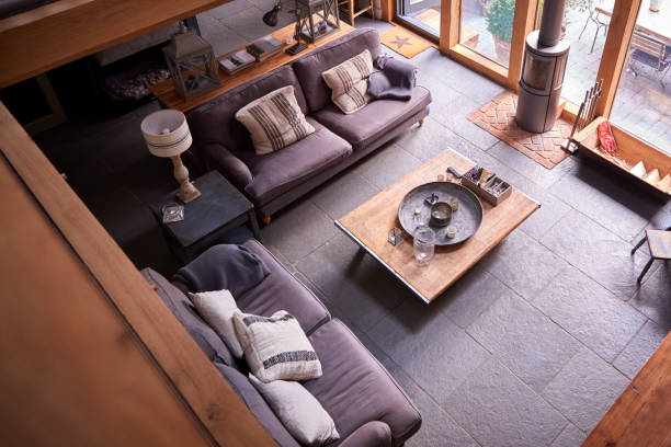 istock Overhead Shot Of Lounge In Modern Open Plan House Or Apartment With Sofas And Table 1360028751