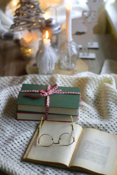 istock Books, Glasses, Candles and Christmas Decorations 1360030283